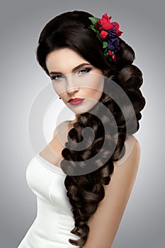 Beautiful woman with gold makeup.Beautiful bride with fashion wedding hairstyle.