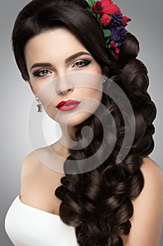 Beautiful woman with gold makeup.Beautiful bride with fashion wedding hairstyle.