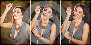 Beautiful woman in gray posing in autumnal park holding a ripe grapes bunch. Young brunette woman eating grapes outdoor in autumn.