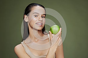 beautiful woman green apple near face health  background