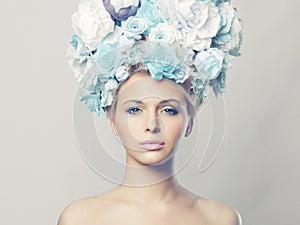 Beautiful woman with hairstyle of flowers