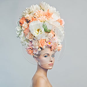 Beautiful woman with hairstyle of flowers