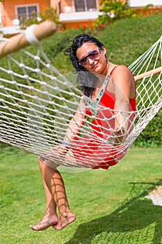 Beautiful woman on the hammock