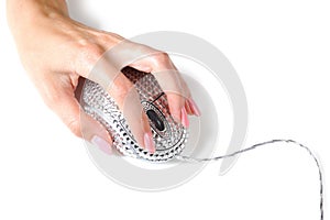 Beautiful woman hand a crystalised computer mouse