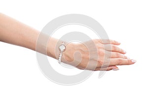 Beautiful woman hand wearing jewelry bracelet with nacre and pearls isolated on white background photo