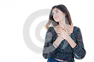 Beautiful woman hands on bust looks white background