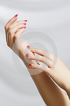 Beautiful Woman Hands. Female Hands Applying Cream, Lotion. Spa and Manicure concept. Female hands with french