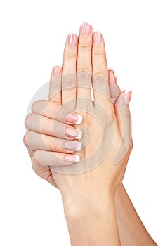 Beautiful woman hands with french manicure isolated