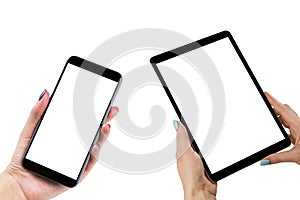 Beautiful Woman hands holding the set of smart phone and tablet computer with isolated white screen. Business workplace with copy