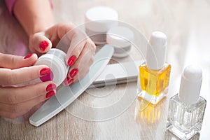 Beautiful woman hands and nails with perfect manicure. Beauty treatment concept. manicure tools