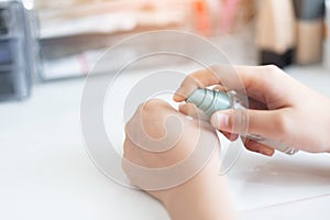 Beautiful woman hands Skin Care. Close Up Of Female Hands Holding Cream Tube, Beautiful Woman Hands With Natural Manicure Nails