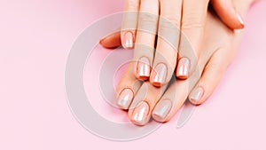 Beautiful Woman Hands. Spa and Manicure concept. Female hands with pink manicure. Soft skin, skincare concept. Beauty