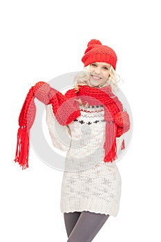 Beautiful woman in hat, muffler and mittens