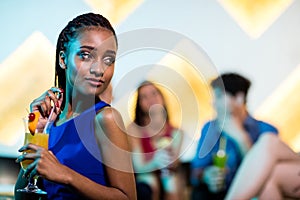 Beautiful woman having a cocktail