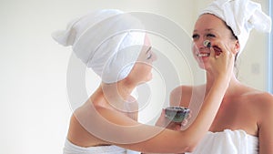 Beautiful woman having a facial treatment at spa.
