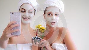 Beautiful woman having a facial treatment at spa.