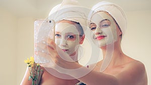 Beautiful woman having a facial treatment at spa.