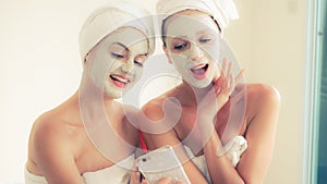 Beautiful woman having a facial treatment at spa.