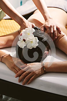 Beautiful woman having a wellness back massage.