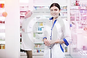 Beautiful woman having a workday in a pharmacy photo