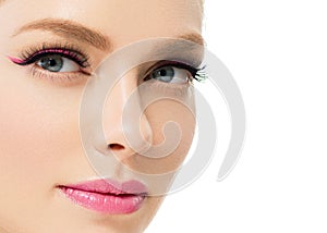 Beautiful woman with healthy skin natural makeup blonde hair beauty face with beauty lashes and pink lips