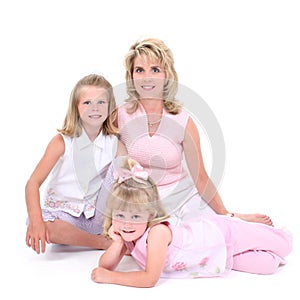 Beautiful Woman With Her Daughters Over White