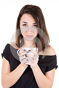 Beautiful woman hold cup of tea coffee in hands in morning