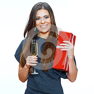 Beautiful woman hold red gift box and wine glass