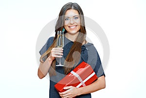 Beautiful woman hold red gift box and wine glass