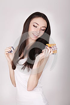 Beautiful Woman Holding Birth Control Pills, Oral Contraceptive