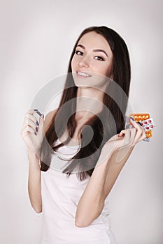 Beautiful Woman Holding Birth Control Pills, Oral Contraceptive