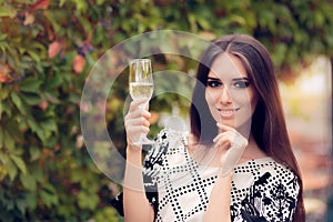 Beautiful Woman Holding Champagne Glass and Celebrating