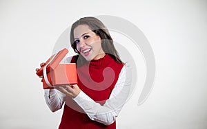 Beautiful woman holding Christmas gifts photo