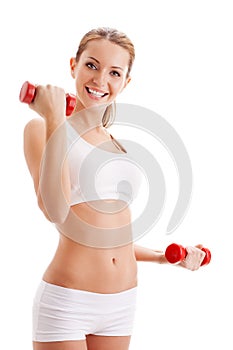 Beautiful woman holding dumbbells