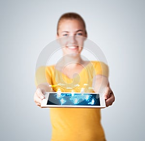 Beautiful woman holding modern tablet with social icons