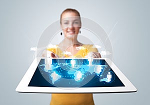 Beautiful woman holding modern tablet with social icons