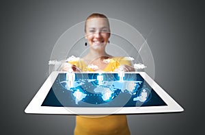 Beautiful woman holding modern tablet with social icons