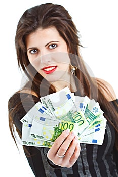Beautiful woman holding money