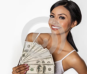 Beautiful woman holding money hundred dollar bills