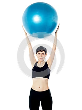 Beautiful woman holding pilates ball