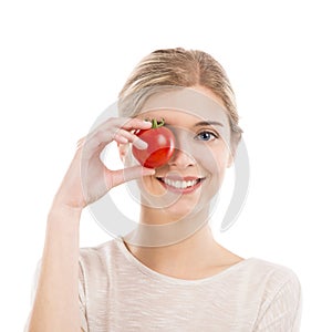 Beautiful woman holding a red chilli pepper