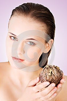 Beautiful woman holding Rose of Jericho