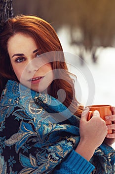 Beautiful woman holding tea cup