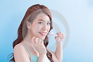 Beautiful woman holding tooth brush