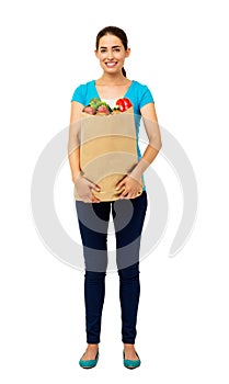 Beautiful Woman Holding Vegetables Bag