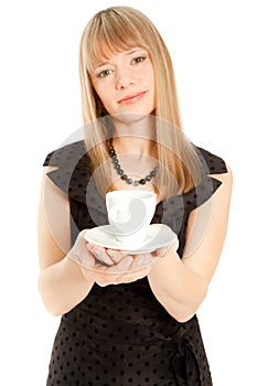 Beautiful woman holding white cup (focus on a cup)