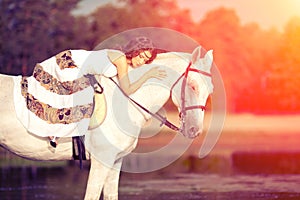 Beautiful woman on a horse. Horseback rider, woman riding horse