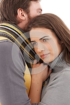 Beautiful woman hugging man