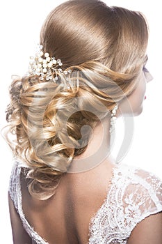 Beautiful woman in image of the bride. Beauty hair. Hairstyle back view