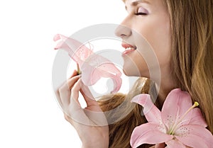 Beautiful woman inhale aroma of lily isolated